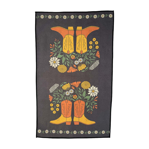 Western Bloom kitchen tea towel with vibrant boot and floral design, eco-friendly, super absorbent, quick-drying, perfect for dishes.