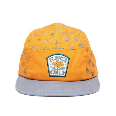 Vibrant orange 5-panel kids snapback hat, flat brim, with "Flower Child" patch. Perfect for young adventurers. Trek Light.