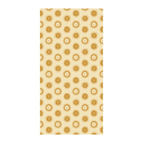 Sunny Wander Towel with unique sun pattern, sand-resistant and quick-dry, made from 100% recycled materials. Ideal for travel.