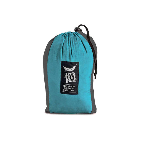 Trek Light Double Hammock in compact travel bag, perfect for camping, or relaxing at home. Durable, flip-proof design. Life's better in a hammock!