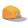 Yellow Flower Child kids hat with flat brim, flower pattern, and Trek Light branding. Unisex 5-panel snapback for young flower lovers.