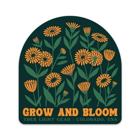 Trek Light Grow and Bloom Sticker: Durable, weatherproof vinyl with orange flowers. Made in USA, size 3.8"x4", UV and water-resistant.