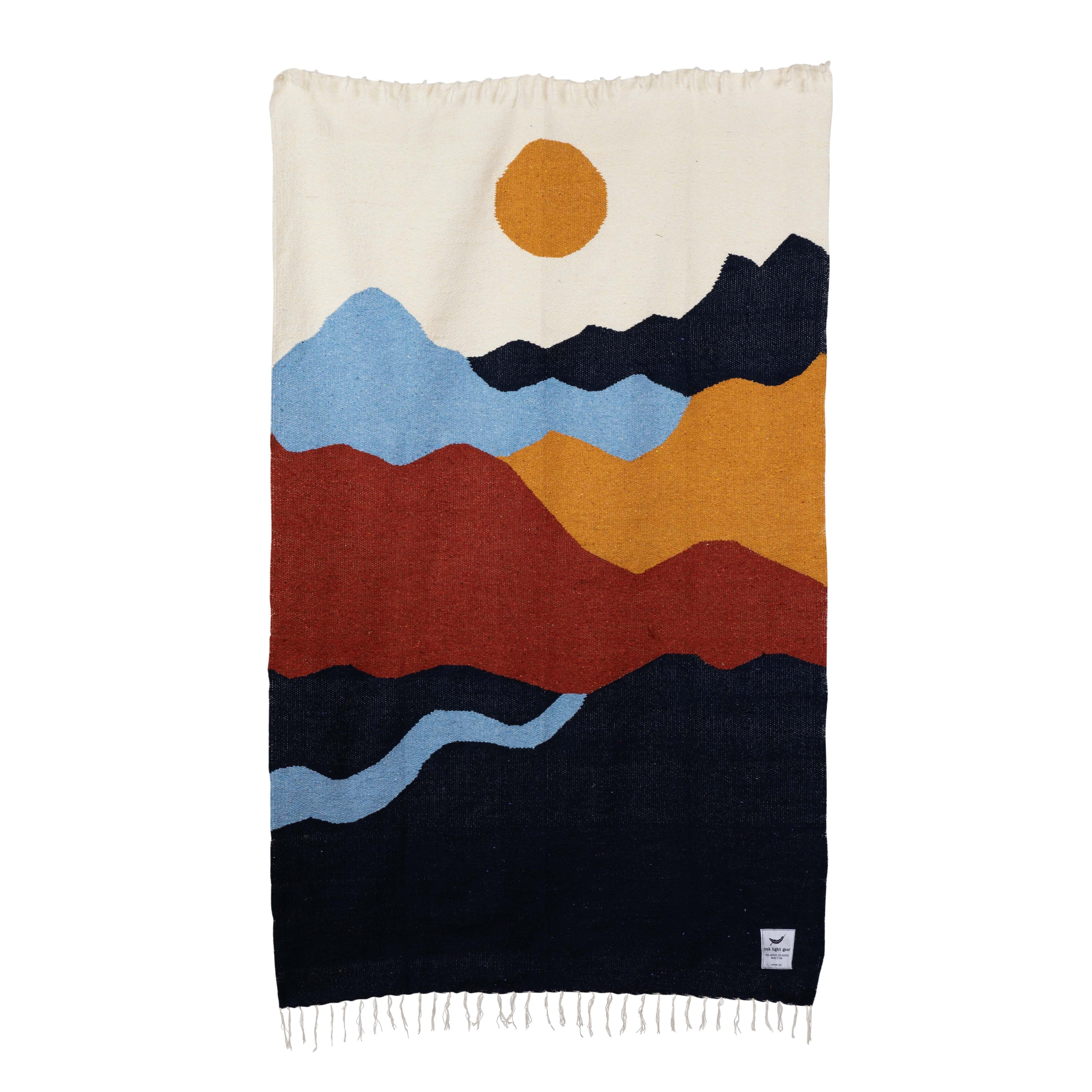 Handwoven Blankets. 100% Recycled Materials. Cozy & Soft. Trek Light.