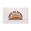 "Take Me to the Mountains" canvas flag wall art by Trek Light, featuring vibrant hand-screened ink and brass grommets for easy hanging.