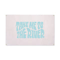 Trek Light canvas flag wall art with 'Take Me to the River' print, 31"x48", featuring brass grommets for easy hanging.