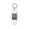 Retro-style key tag with 'This Must Be The Place' text, perfect for Trek Light adventures and nostalgic vibes.